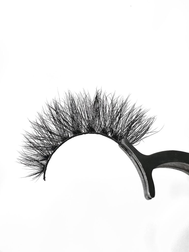 Step-by-step guide showing how to apply false lashes for beginners using tweezers