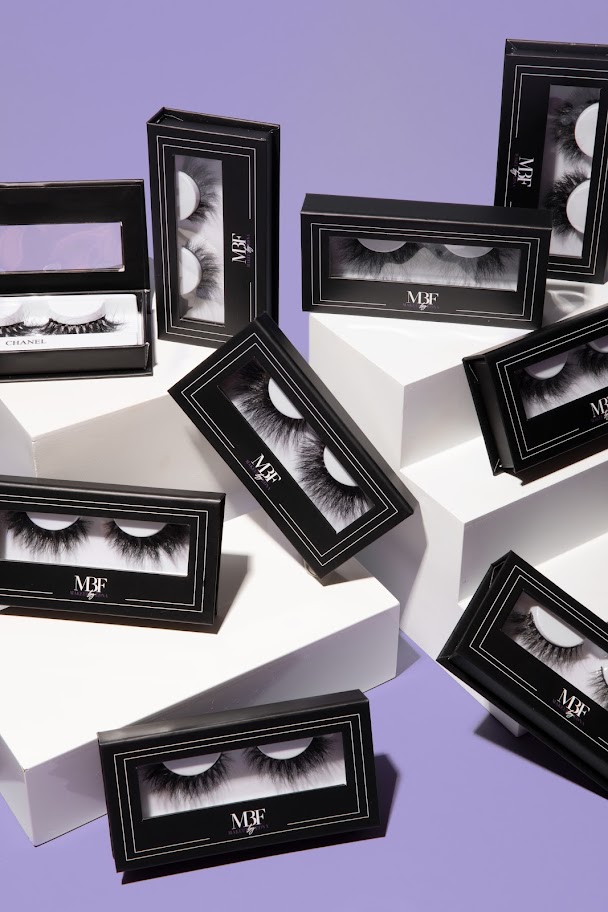 Technician applying oil based lash remover at BeautyMBF for clean lash line