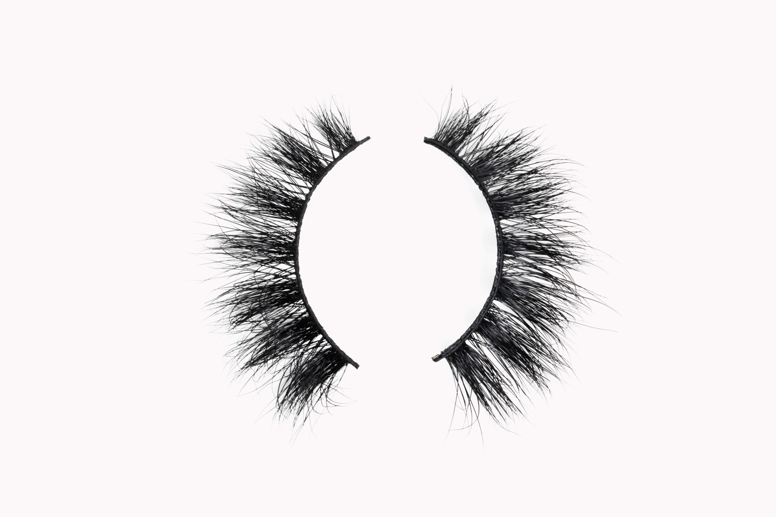Close-up of soft, lightweight false lashes designed for sensitive eyes, showing fluttery lash fibres ideal for comfort, natural volume, and irritation-free wear — best false lashes for sensitive eyes.